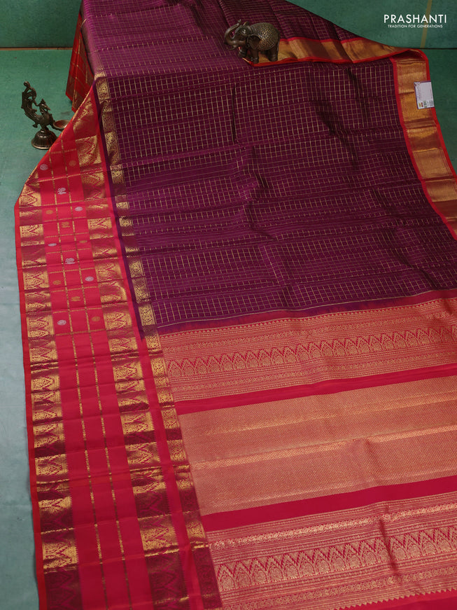 Pure kanchipuram silk saree purple and dual shade of pinkish orange with allover zari checked pattern and long zari woven border