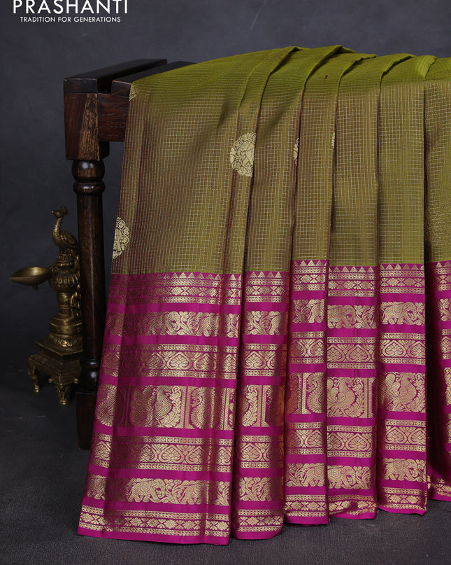 Pure kanchipuram silk saree mehendi green and magenta pink with allover zari checked pattern and long zari woven border