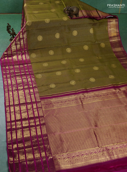 Pure kanchipuram silk saree mehendi green and magenta pink with allover zari checked pattern and long zari woven border