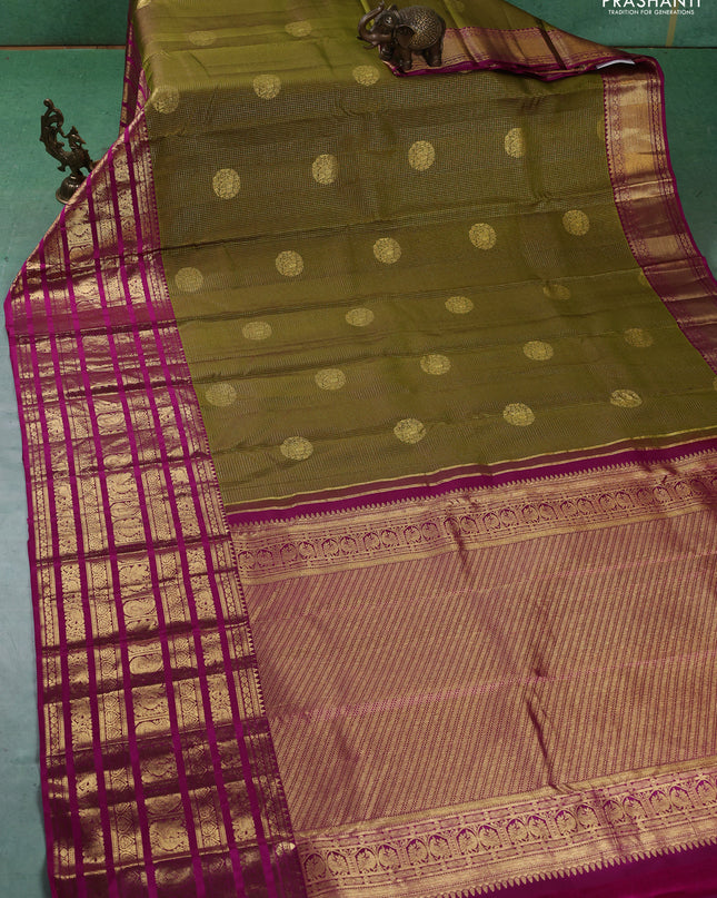 Pure kanchipuram silk saree mehendi green and magenta pink with allover zari checked pattern and long zari woven border