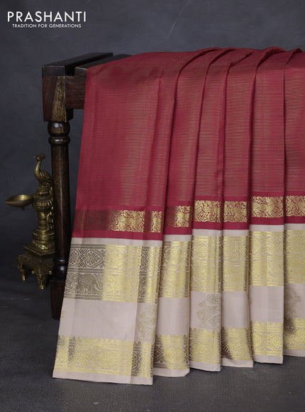 Pure kanchipuram silk saree red and beige with allover zari stripes pattern and rettapet zari woven border
