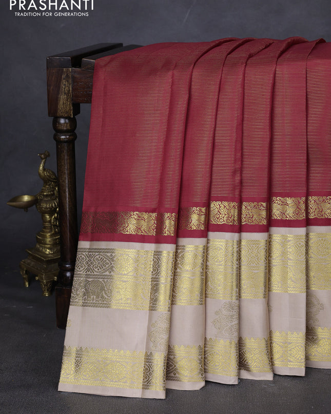 Pure kanchipuram silk saree red and beige with allover zari stripes pattern and rettapet zari woven border