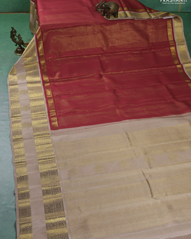 Pure kanchipuram silk saree red and beige with allover zari stripes pattern and rettapet zari woven border