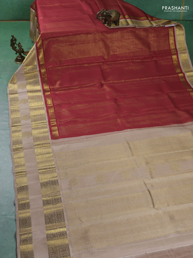 Pure kanchipuram silk saree red and beige with allover zari stripes pattern and rettapet zari woven border