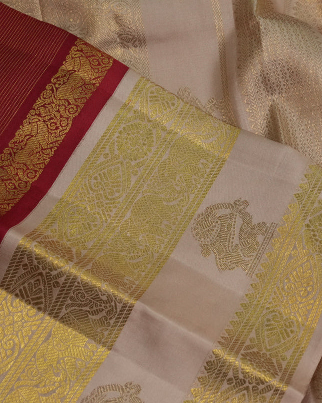 Pure kanchipuram silk saree red and beige with allover zari stripes pattern and rettapet zari woven border