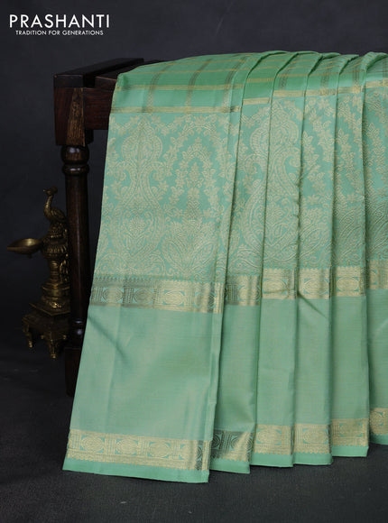 Pure kanchipuram silk saree pastel green with allover zari checked pattern and rettapet zari woven border