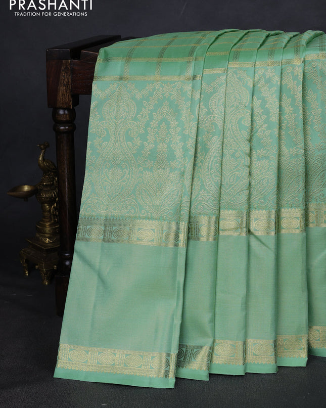 Pure kanchipuram silk saree pastel green with allover zari checked pattern and rettapet zari woven border