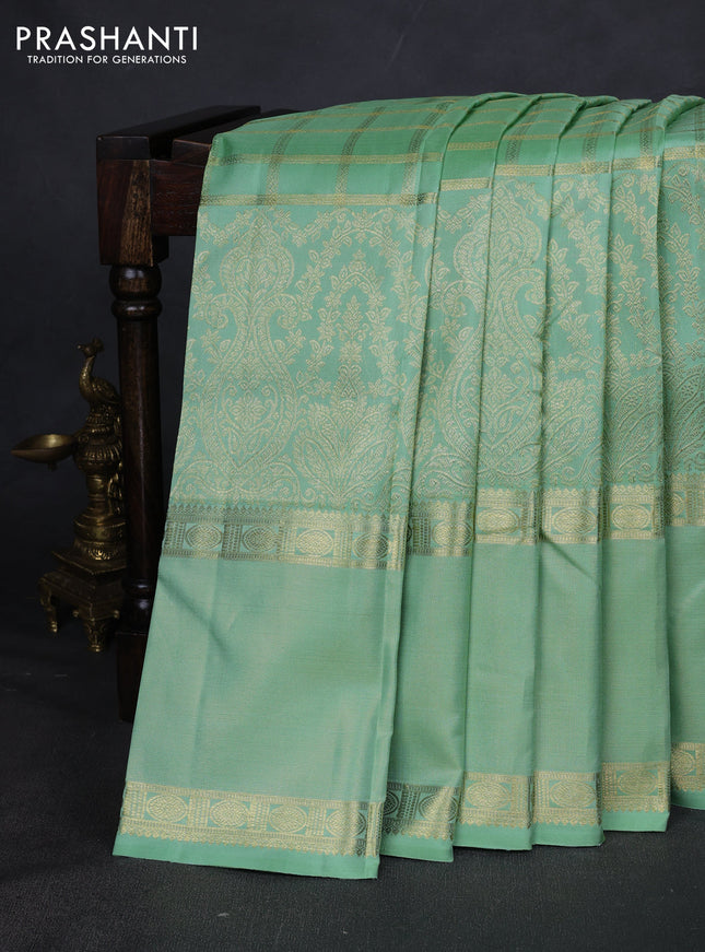 Pure kanchipuram silk saree pastel green with allover zari checked pattern and rettapet zari woven border