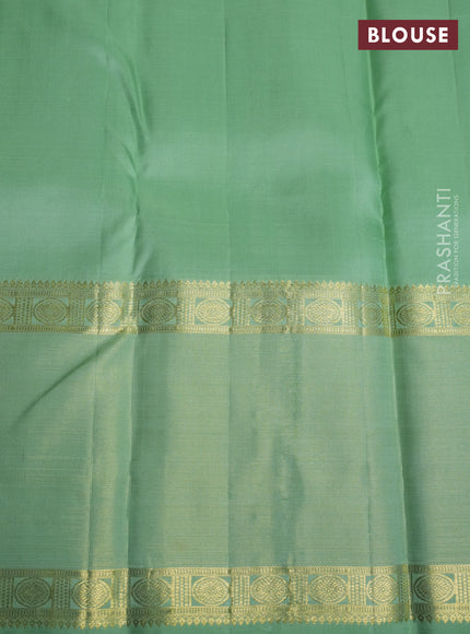 Pure kanchipuram silk saree pastel green with allover zari checked pattern and rettapet zari woven border
