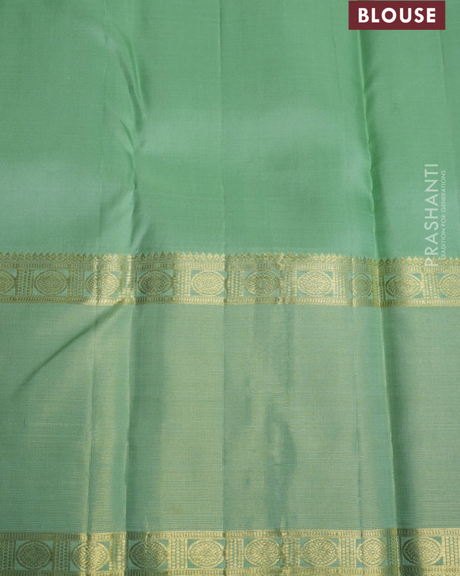 Pure kanchipuram silk saree pastel green with allover zari checked pattern and rettapet zari woven border