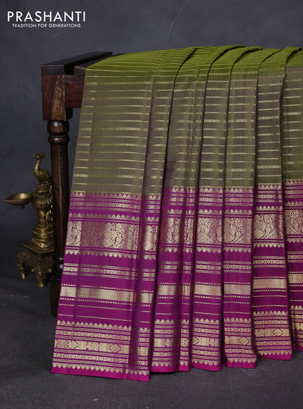 Pure kanchipuram silk saree mehendi green and purple with allover zari stripes pattern and long zari woven border