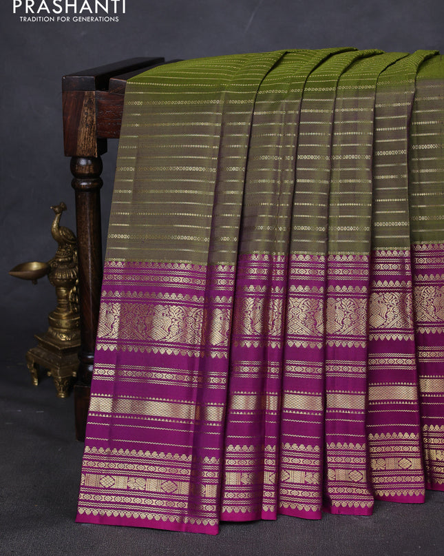Pure kanchipuram silk saree mehendi green and purple with allover zari stripes pattern and long zari woven border