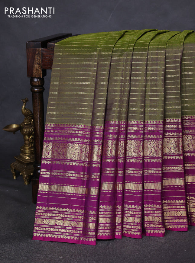 Pure kanchipuram silk saree mehendi green and purple with allover zari stripes pattern and long zari woven border