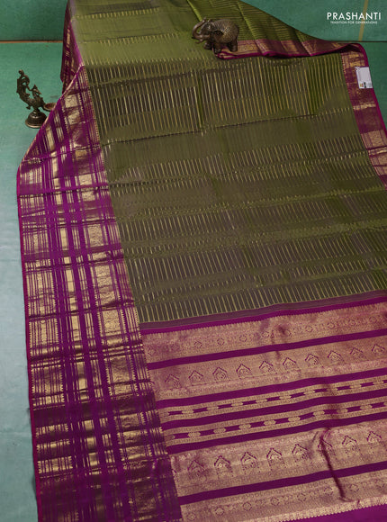 Pure kanchipuram silk saree mehendi green and purple with allover zari stripes pattern and long zari woven border