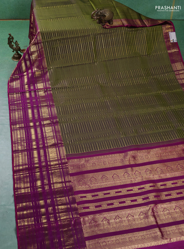 Pure kanchipuram silk saree mehendi green and purple with allover zari stripes pattern and long zari woven border