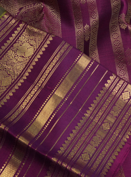Pure kanchipuram silk saree mehendi green and purple with allover zari stripes pattern and long zari woven border