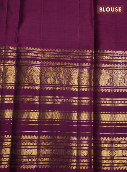 Pure kanchipuram silk saree mehendi green and purple with allover zari stripes pattern and long zari woven border