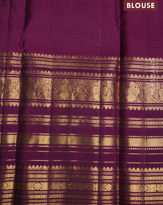 Pure kanchipuram silk saree mehendi green and purple with allover zari stripes pattern and long zari woven border