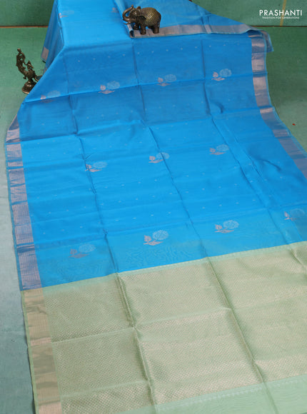 Kora silk cotton saree light blue and pista green with silver zari woven buttas and zari woven border
