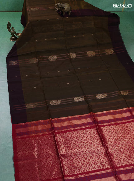 Kora silk cotton saree dark sap green and maroon with zari woven buttas and zari woven border