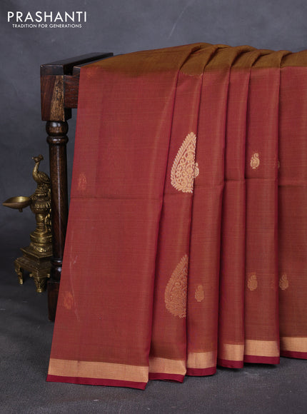 Kora silk cotton saree dual shade of rust and maroon with zari woven buttas and zari woven border