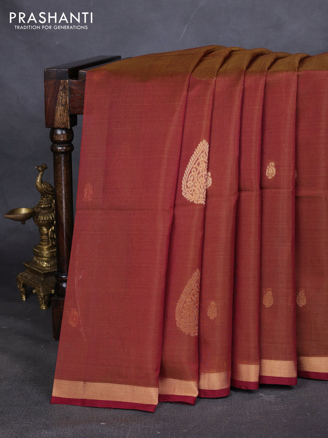 Kora silk cotton saree dual shade of rust and maroon with zari woven buttas and zari woven border