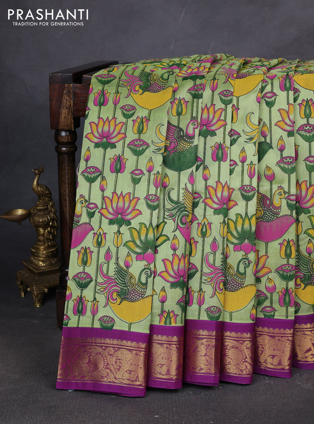 Silk cotton saree pista green and purple with allover kalamakri prints and zari woven korvai border