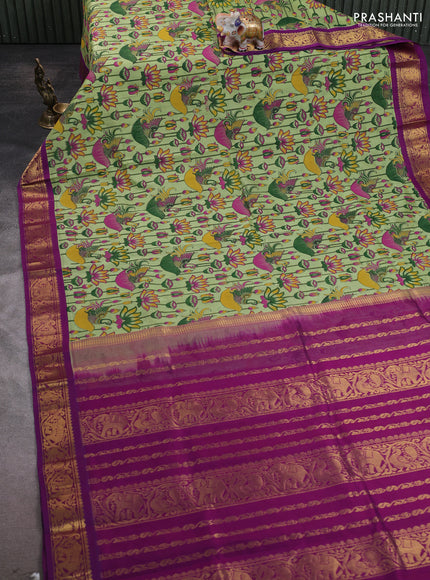 Silk cotton saree pista green and purple with allover kalamakri prints and zari woven korvai border