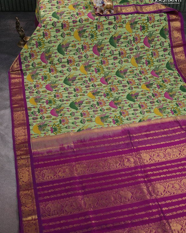 Silk cotton saree pista green and purple with allover kalamakri prints and zari woven korvai border