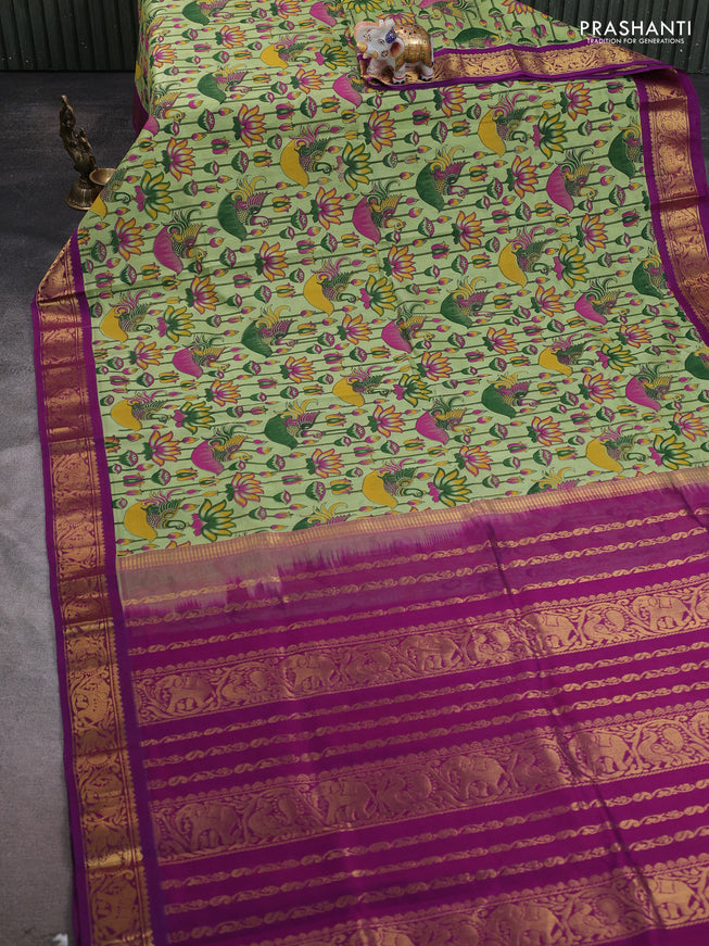 Silk cotton saree pista green and purple with allover kalamakri prints and zari woven korvai border