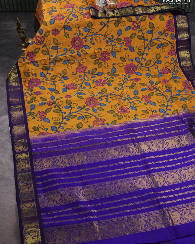 Silk cotton saree mango yellow and blue with allover kalamakri prints and zari woven korvai border