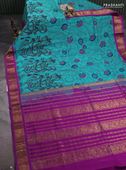 Silk cotton saree teal green and purple with allover kalamakri prints and zari woven korvai border