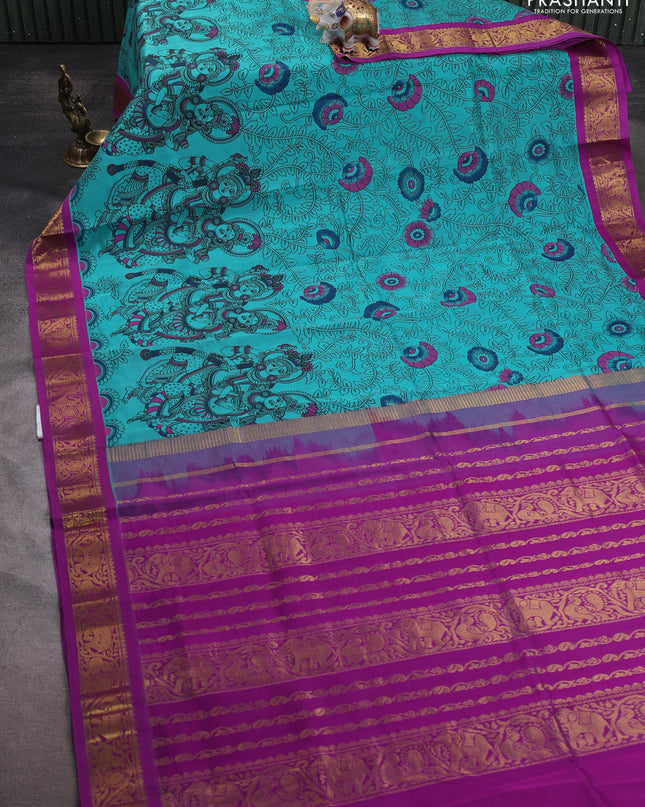 Silk cotton saree teal green and purple with allover kalamakri prints and zari woven korvai border