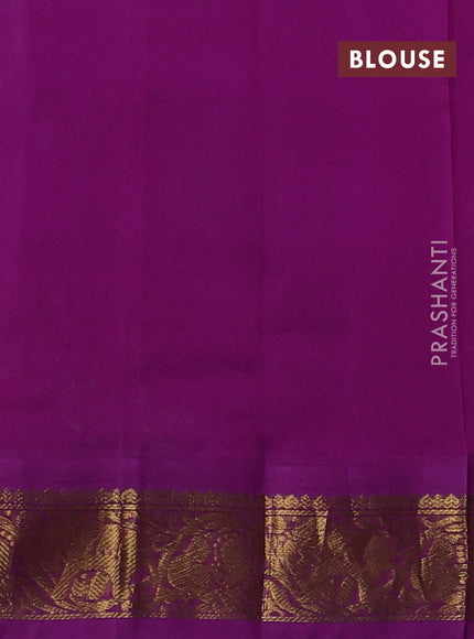 Silk cotton saree teal green and purple with allover kalamakri prints and zari woven korvai border