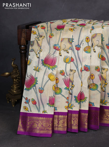 Silk cotton saree cream and purple with allover kalamakri prints and zari woven korvai border