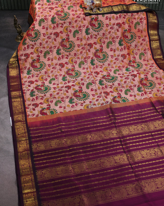 Silk cotton saree peach orange and deep wine with allover kalamakri prints and zari woven korvai border