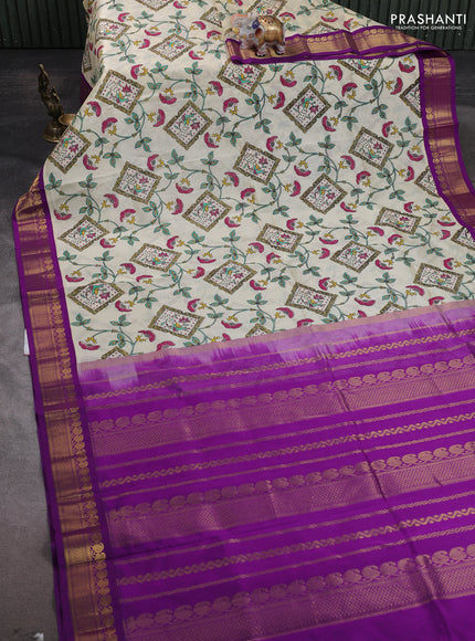 Silk cotton saree cream and purple with allover kalamakri prints and zari woven korvai border