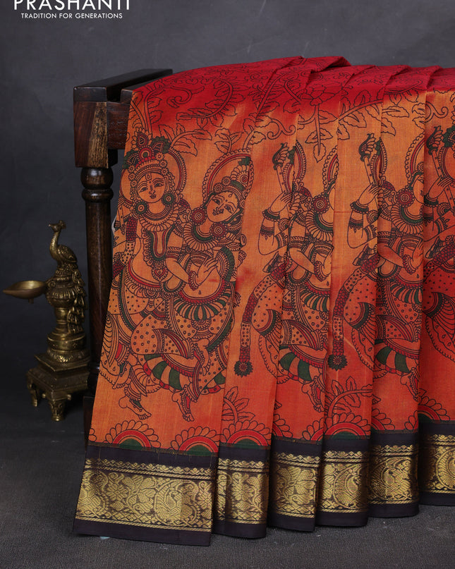 Silk cotton saree orange and maroon with allover kalamakri prints and zari woven korvai border