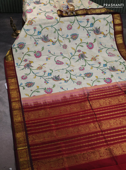 Silk cotton saree cream and maroon with allover kalamakri prints and zari woven korvai border
