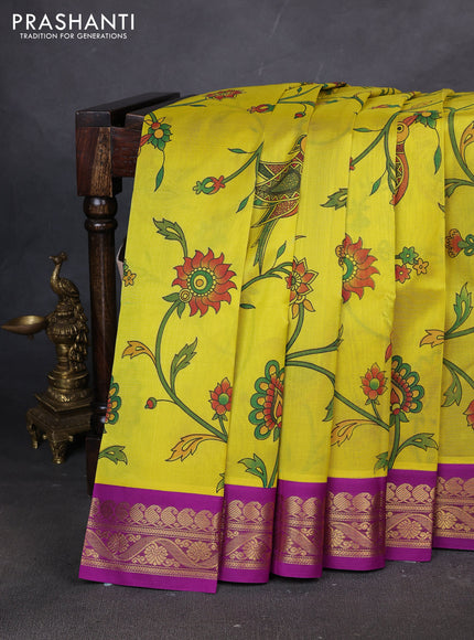 Silk cotton saree yellow and purple with allover kalamakri prints and zari woven korvai border