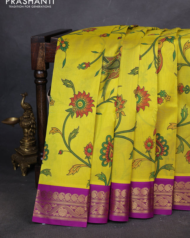 Silk cotton saree yellow and purple with allover kalamakri prints and zari woven korvai border