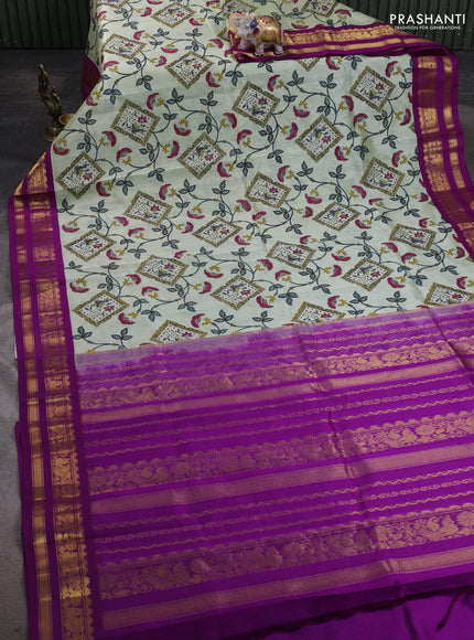Silk cotton saree pista green and purple with allover kalamakri prints and zari woven korvai border