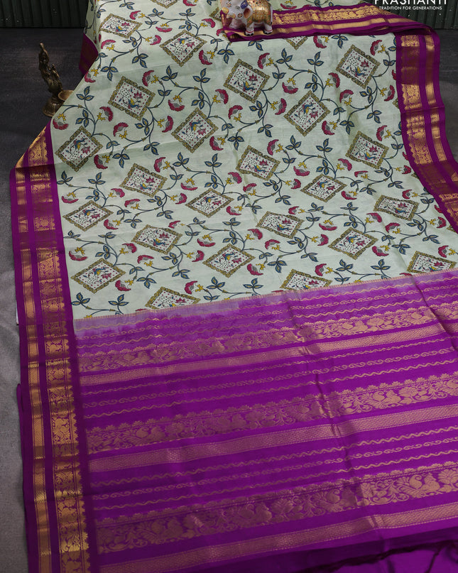 Silk cotton saree pista green and purple with allover kalamakri prints and zari woven korvai border