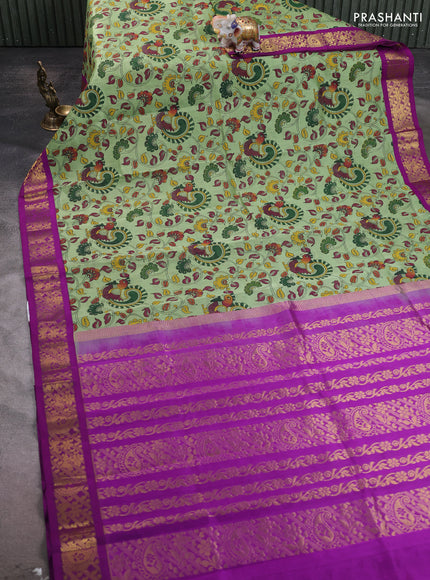 Silk cotton saree pista green and purple with allover kalamakri prints and zari woven korvai border