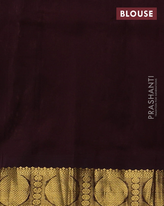 Silk cotton saree peach shade and coffee brown with allover kalamakri prints and zari woven korvai border