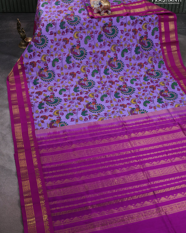 Silk cotton saree lavender and purple with allover kalamakri prints and zari woven korvai border