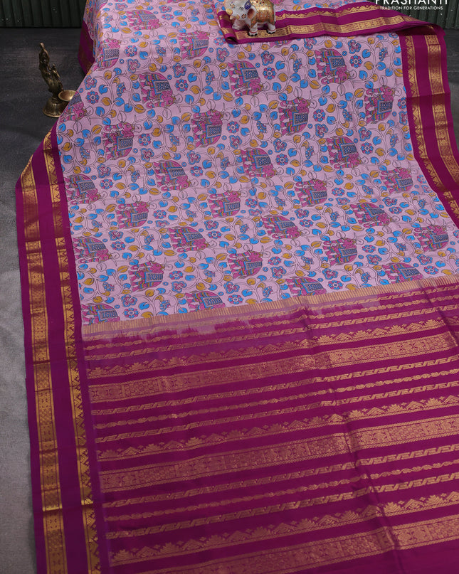 Silk cotton saree lavender and purple with allover kalamakri prints and zari woven korvai border