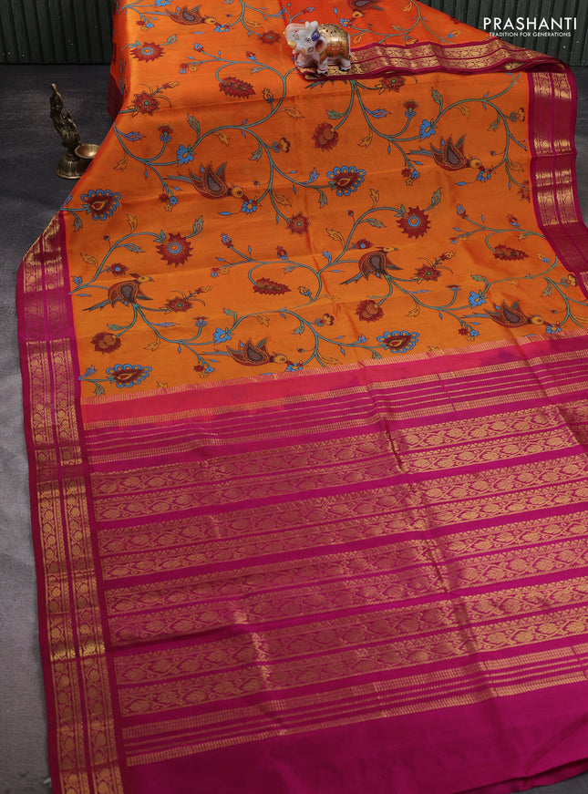 Silk cotton saree orange and pink with allover kalamakri prints and zari woven korvai border