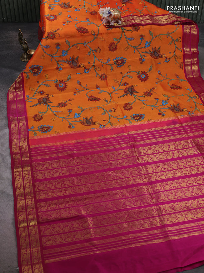Silk cotton saree orange and pink with allover kalamakri prints and zari woven korvai border