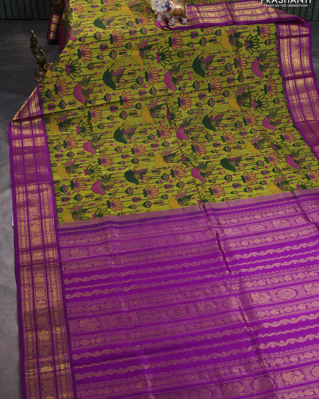 Silk cotton saree mehendi green and purple with allover kalamakri prints and zari woven korvai border